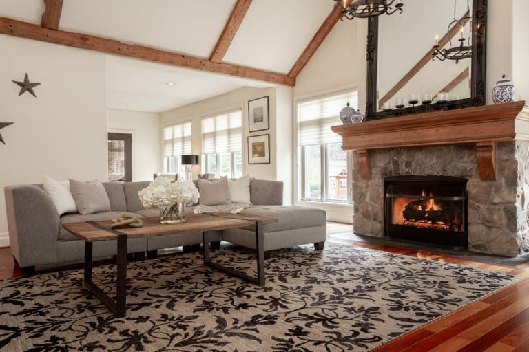 Recent Listings 111 by Snapscene Photography rustic country living room with large fire place and vaulted ceilings