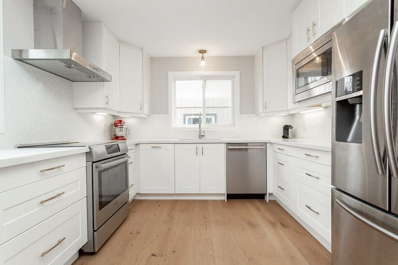 bright white modern kitchen renovated for real estate sale