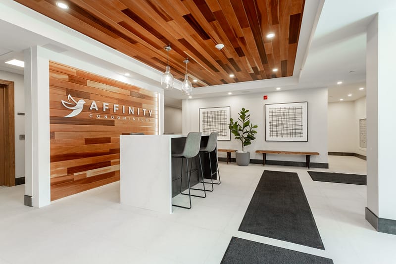 Modern reception area with wood ceilings at 340 Plains Road Burlington