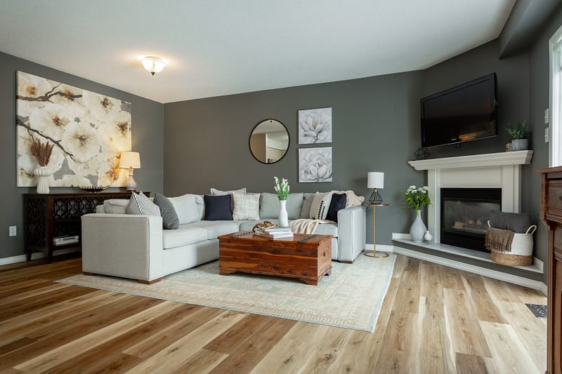 The comfy living room at 121-3333 New Street for a real estate listing in Burlington and Oakville